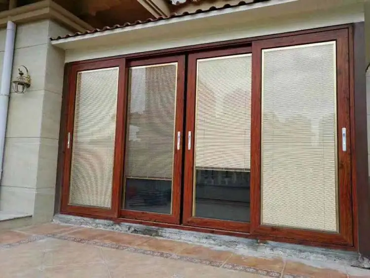 Mẫu cửa kính cường lực phòng khách đẹp hiện đại 2025